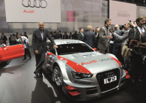 Rennfahrerlegende Hans Joachim Stuck am Audi A5 DTM bei der Volkswagen Group Night - IAA Frankfurt 2011
