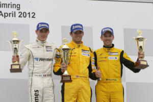 Porsche Carrera Cup Deutschland 2012 2.Lauf Kévin Estre (F), Sean Edwards (GB), René Rast (D) auf dem Podium Porsche Carrera Cup Deutschland 2012 2.Lauf Kévin Estre (F), Sean Edwards (GB),René Rast (D) auf dem Podium