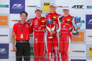 Formel 3 EM 2018 Podest Zandvoort Rennen 1 Prize giving ceremony, Mattia Oselladore (Technical director PREMA Theodore Racing), 1 Guanyu Zhou (CHN, PREMA Theodore Racing, Dallara F317 - Mercedes-Benz), 7 Ralf Aron (EST, PREMA Theodore Racing, Dallara F317 - Mercedes-Benz), 4 Mick Schumacher (DEU © F3 EM